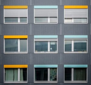 Outside view of office windows with colorful valences